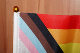 Progress pride handheld flag small